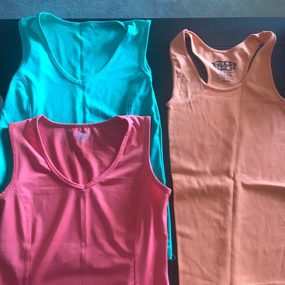 3 tang tops like new , never worn